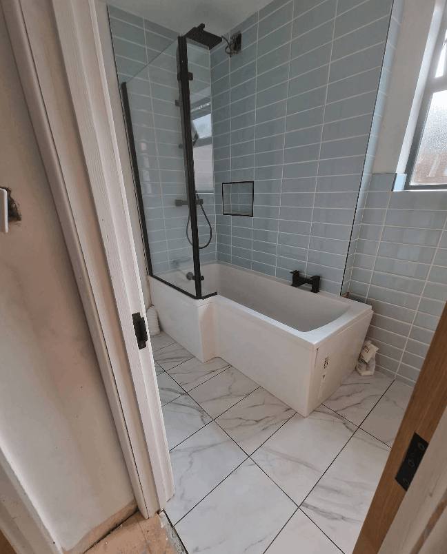 Sage green tile bath renovation